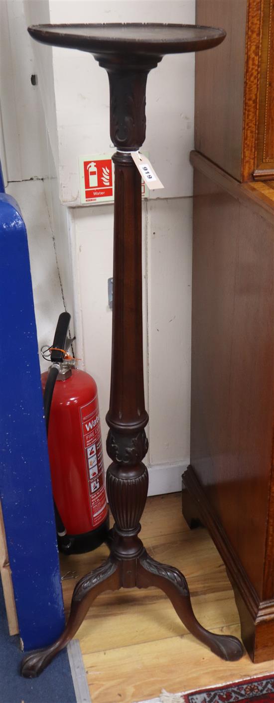 A late 18th century style Victorian mahogany torchere, triple splayed leaf carved supports, claw and ball feet H.124cm